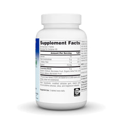 Planetary Herbals Triphala Gold tablets close-up reveals texture and golden color.