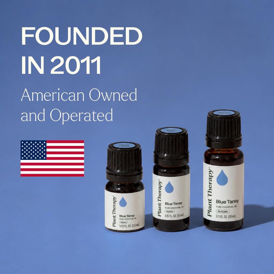 Plant Therapy frasco 2.5 mL al lado de una moneda para comparar tamaño y dosificación
