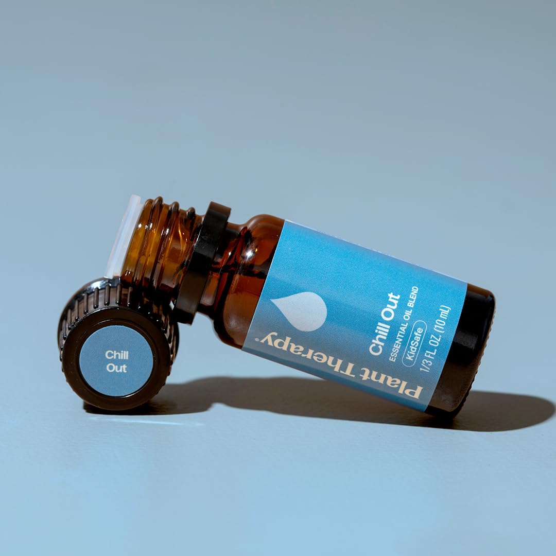 Plant Therapy botella junto a regla para comparar tamaño práctico