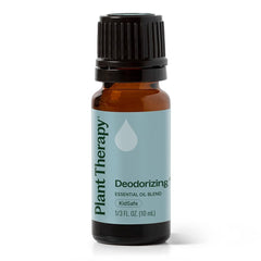 Comparación de tamaño del frasco Plant Therapy 10 ml junto a objetos cotidianos para referencia