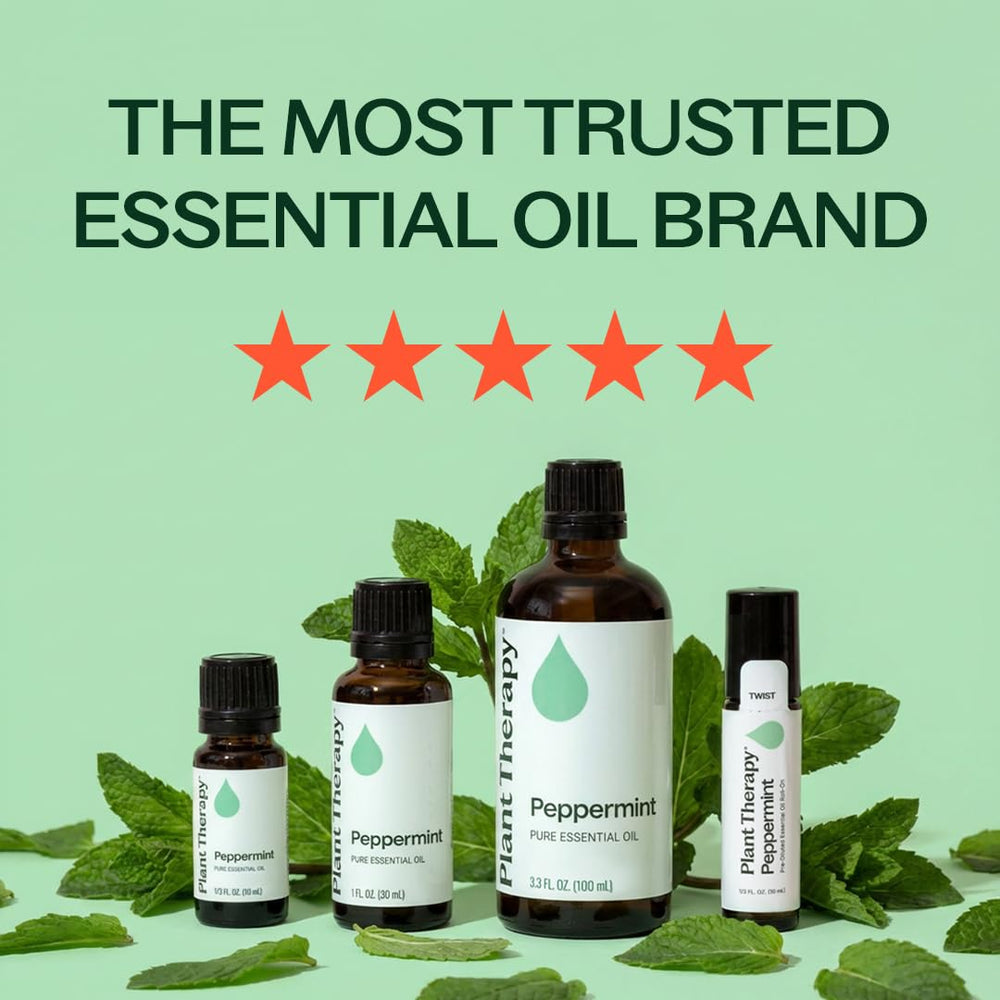 Gota de aceite de menta Plant Therapy en superficie que revela textura pura