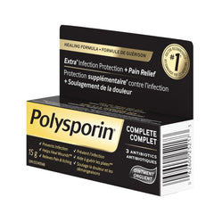 Polysporin tubo 15 g junto a moneda para referencia de tamaño