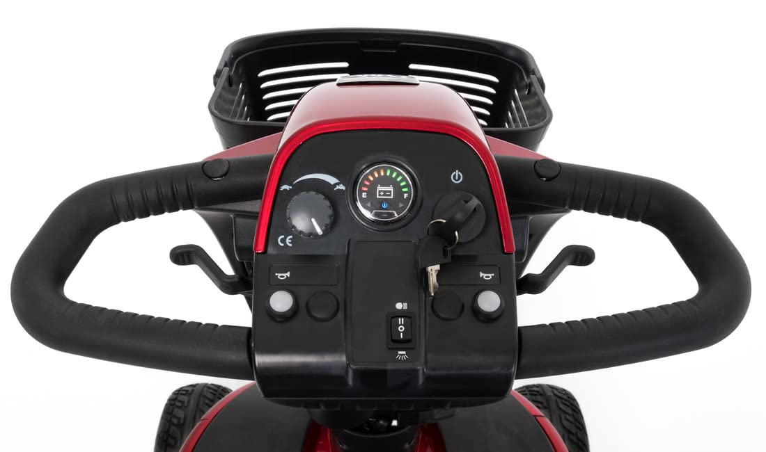 Precision Auto Products llaves junto a un scooter Pride mostrando compatibilidad