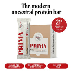 Prima Ancestral Protein Bar junto a una taza de café estilo mocha evocando sabor