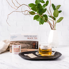 Prince of Peace bolsita en taza infusionando y beneficio de aroma equilibrado