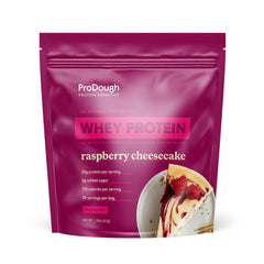 ProDough frente del empaque mostrando sabor Raspberry Cheesecake y beneficios