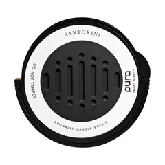 Pura Santorini envase frontal mostrando diseño elegante y aroma mediterráneo