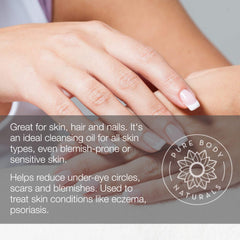 Pure Body Naturals gota de aceite en primer plano con textura ligera
