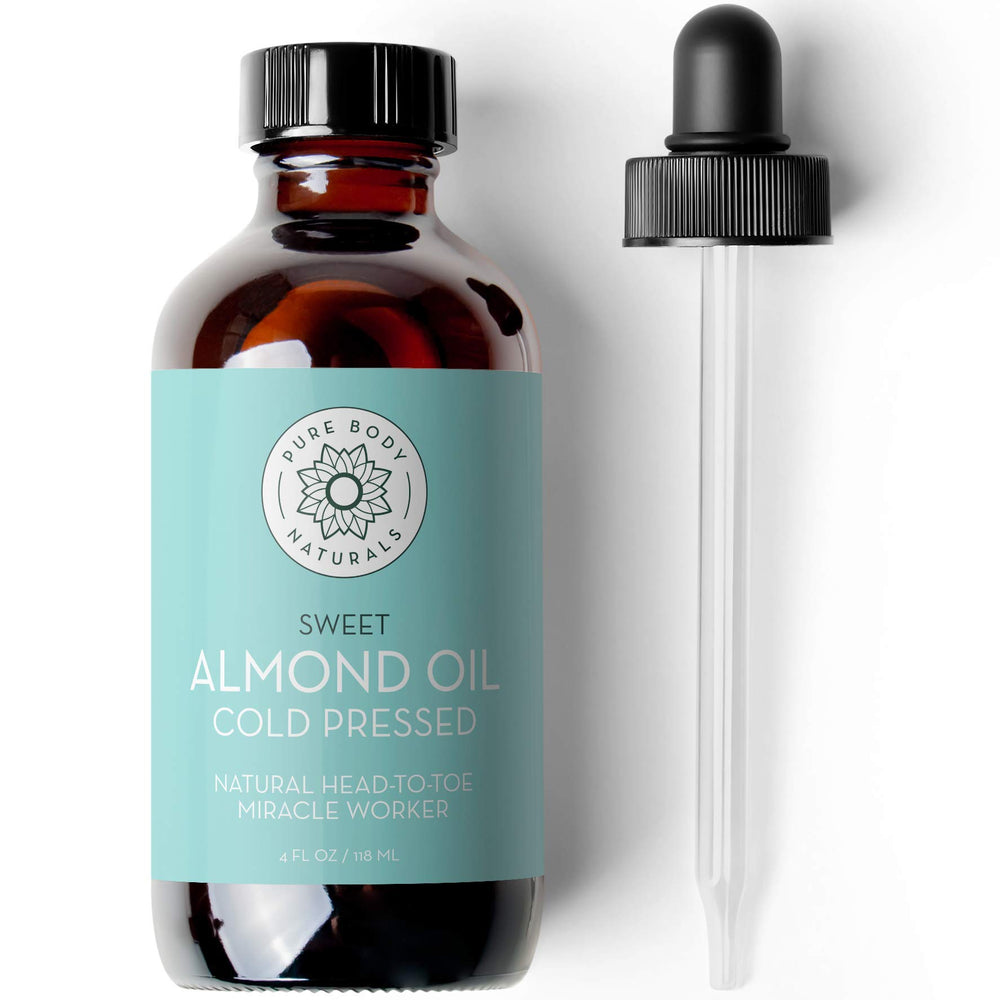 Pure Body Naturals botella frontal mostrando aceite y beneficio hidratante