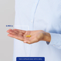 Pure Encapsulations cápsula en mano para comparar tamaño y dosificación práctica