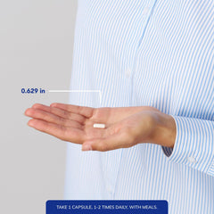 Pure Encapsulations Iodine cápsula en la palma de la mano, ilustra tamaño real para consumo