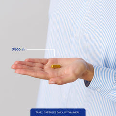 Pure Encapsulations frasco en mano para comparar tamaño y dosis