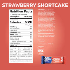 Pure Protein barra cortada revelando centro sabor pastel de fresa y proteína
