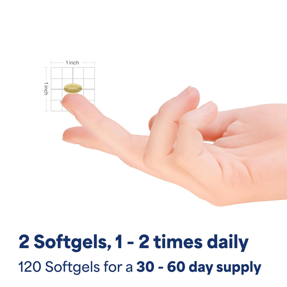 Puritan's Pride cápsula en mano demostrando tamaño fácil de tragar