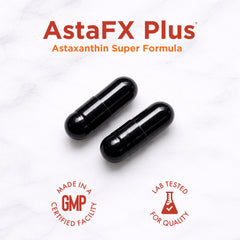 Purity Products AstaFX Plus comparación de tamaño junto a una moneda para escala