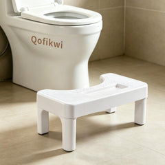 Qofikwi taburete frontal mostrando diseño estable y moderno