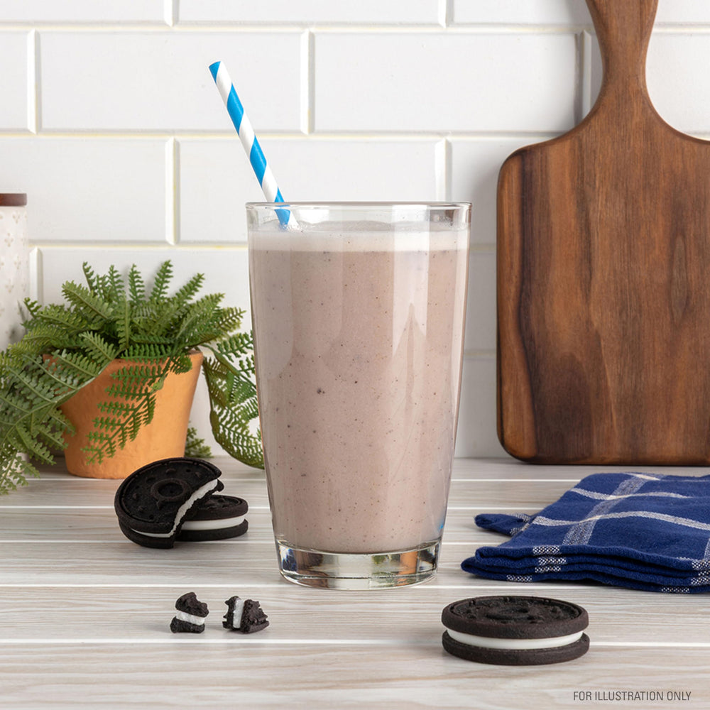 Quest batido servido en vaso demostrando mezcla fácil y sabor indulgente