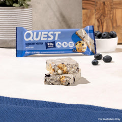 Quest barra abierta mostrando migas y relleno, apetitosa y nutritiva