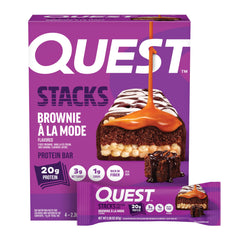 Quest Stacks frente del empaque mostrando caja de 4 barras y atractivo visual