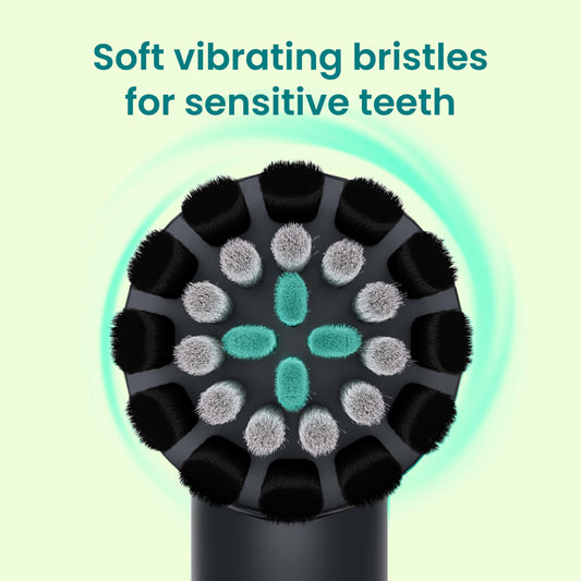 quip detalle de cerdas dual-length que mejora alcance interdental
