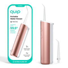 quip irrigador frontal mostrando diseño compacto y orden en el baño
