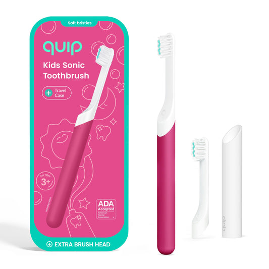 Quip cepillo infantil frontal en Wonder Pink mostrando diseño y beneficio práctico
