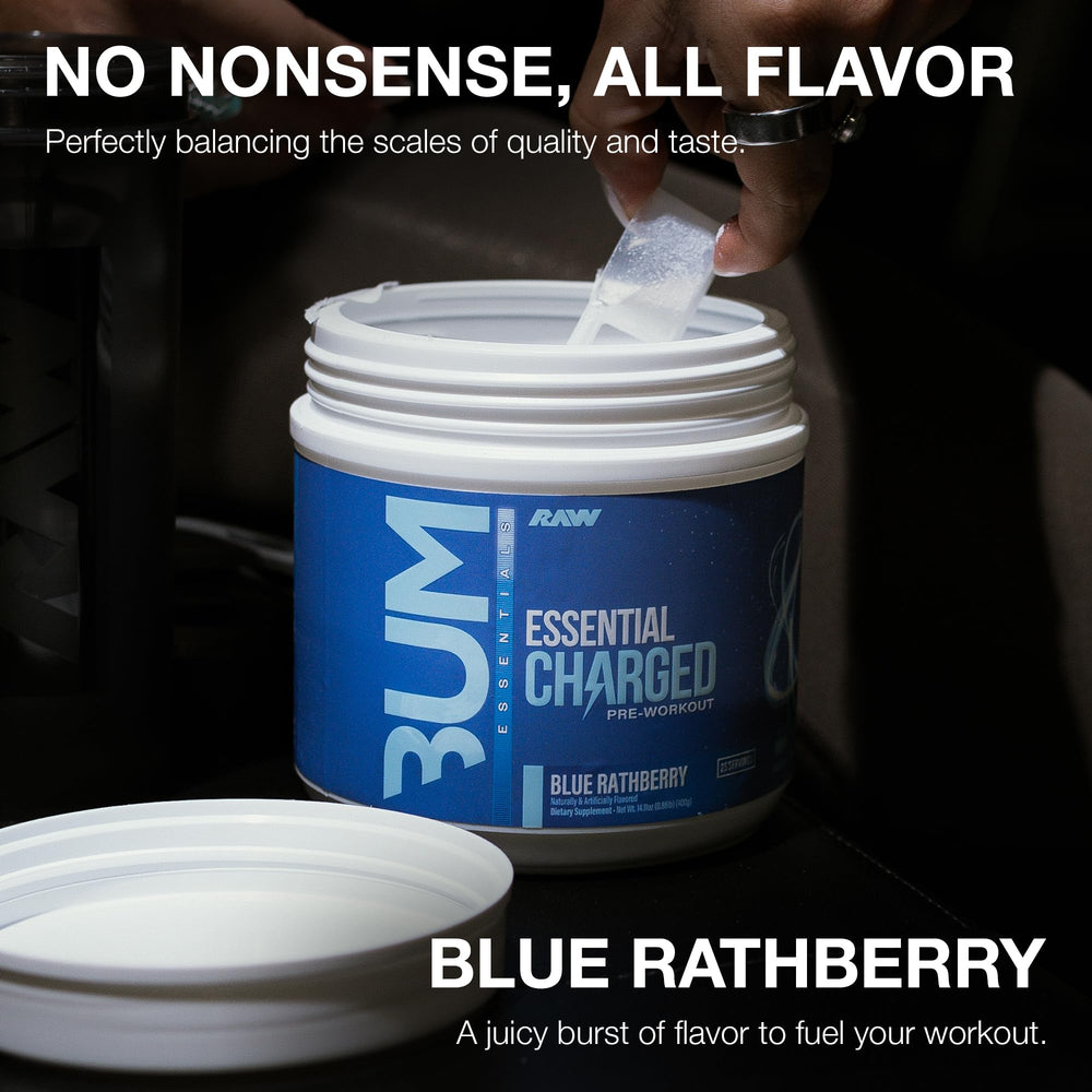 Pouring RAW Essential Charged blue raspberry pre-workout before training