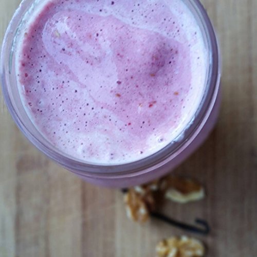 Raw Organic Whey cuchara medidora con polvo mostrando porción y control
