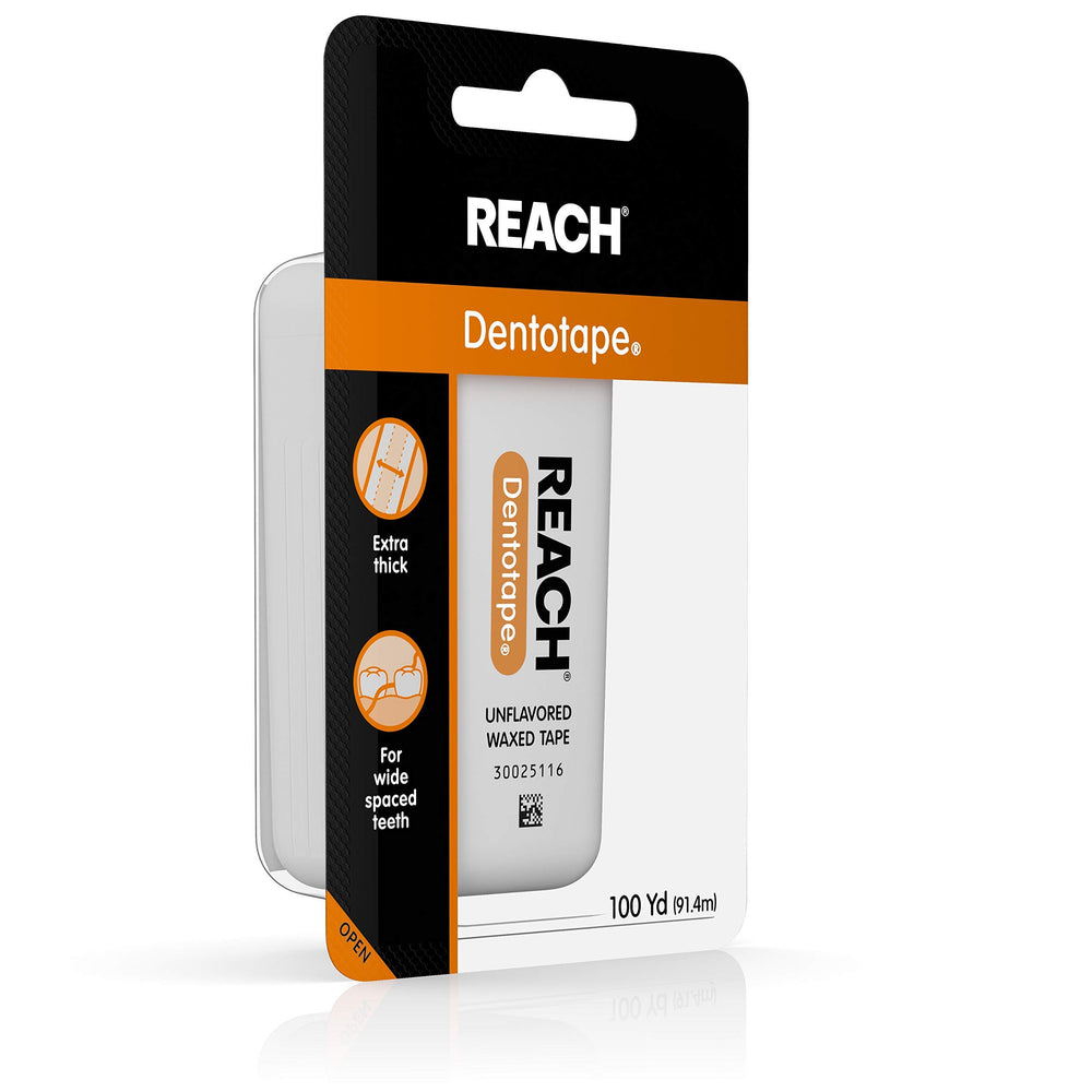 Reach primer plano de textura encerada de la cinta dental, facilita el deslizamiento