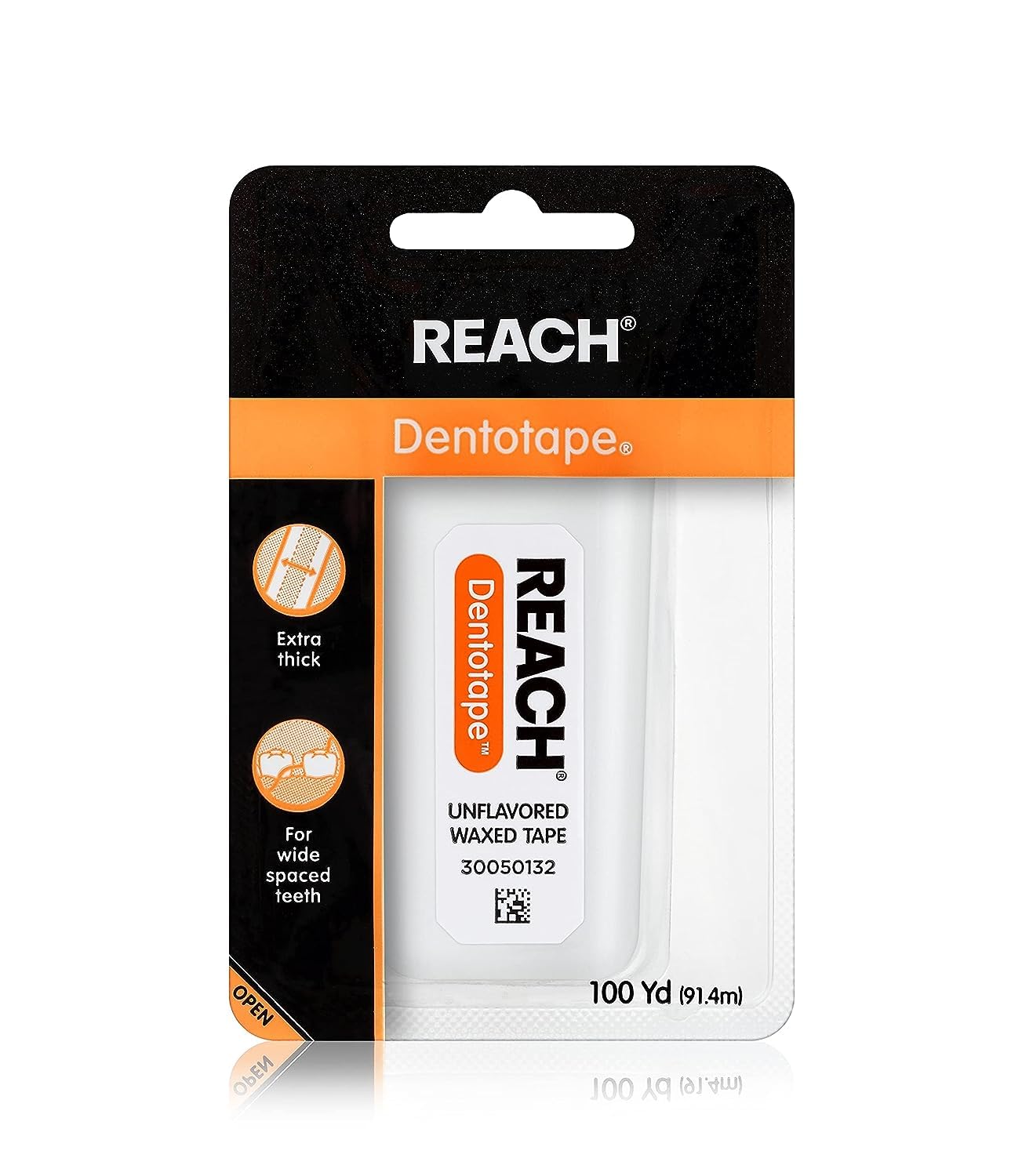 Reach Dentotape royo abierto mostrando la cinta extra ancha y control fácil