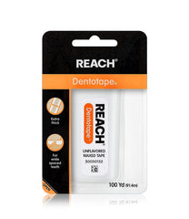 Reach Dentotape royo abierto mostrando la cinta extra ancha y control fácil