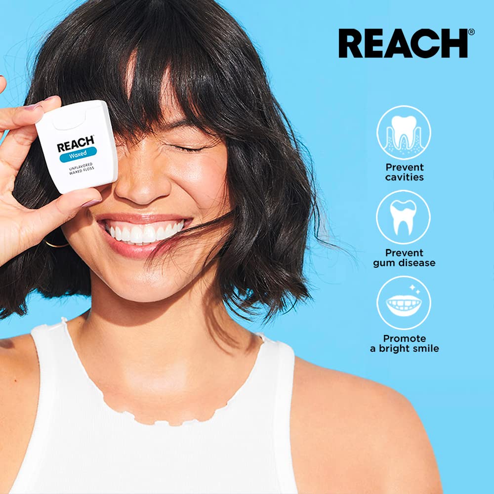 Reach hilo dental en uso entre dientes para limpieza interdental eficaz