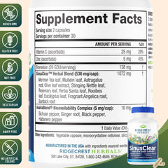 RidgeCrest Herbals cápsula junto a una moneda para apreciar tamaño y dosificación