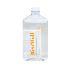 RiseWell envase frontal 16 oz mostrando marca y beneficio de pH equilibrado