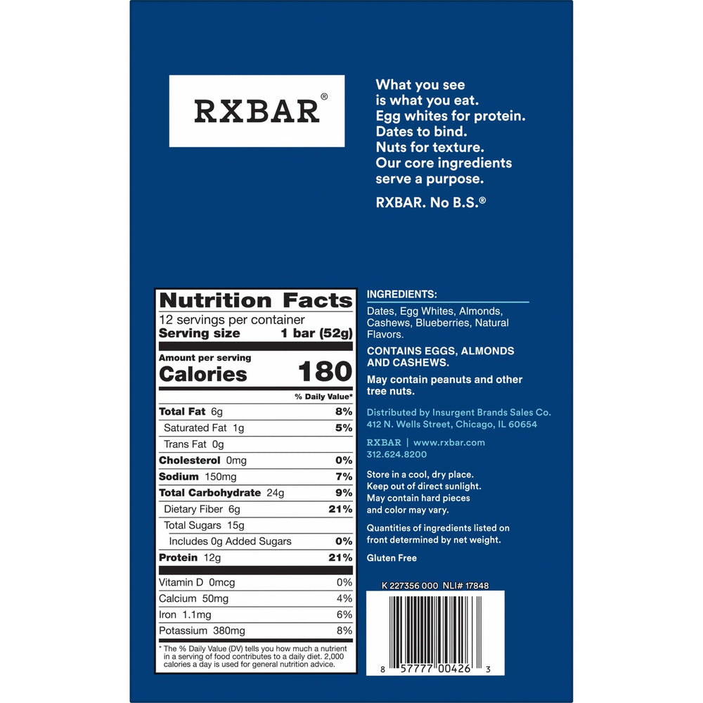 RXBAR barra junto a taza de café en oficina para un snack equilibrado