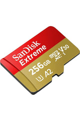 SanDisk Extreme junto a una regla para comparar tamaño y entender portabilidad
