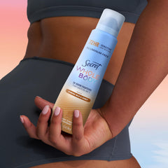 Secret en baño junto a otros productos para rutina corporal completa