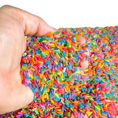 Sensory-N-Stuff frente del paquete mostrando arroz arcoíris y colores vivos, ideal para juego