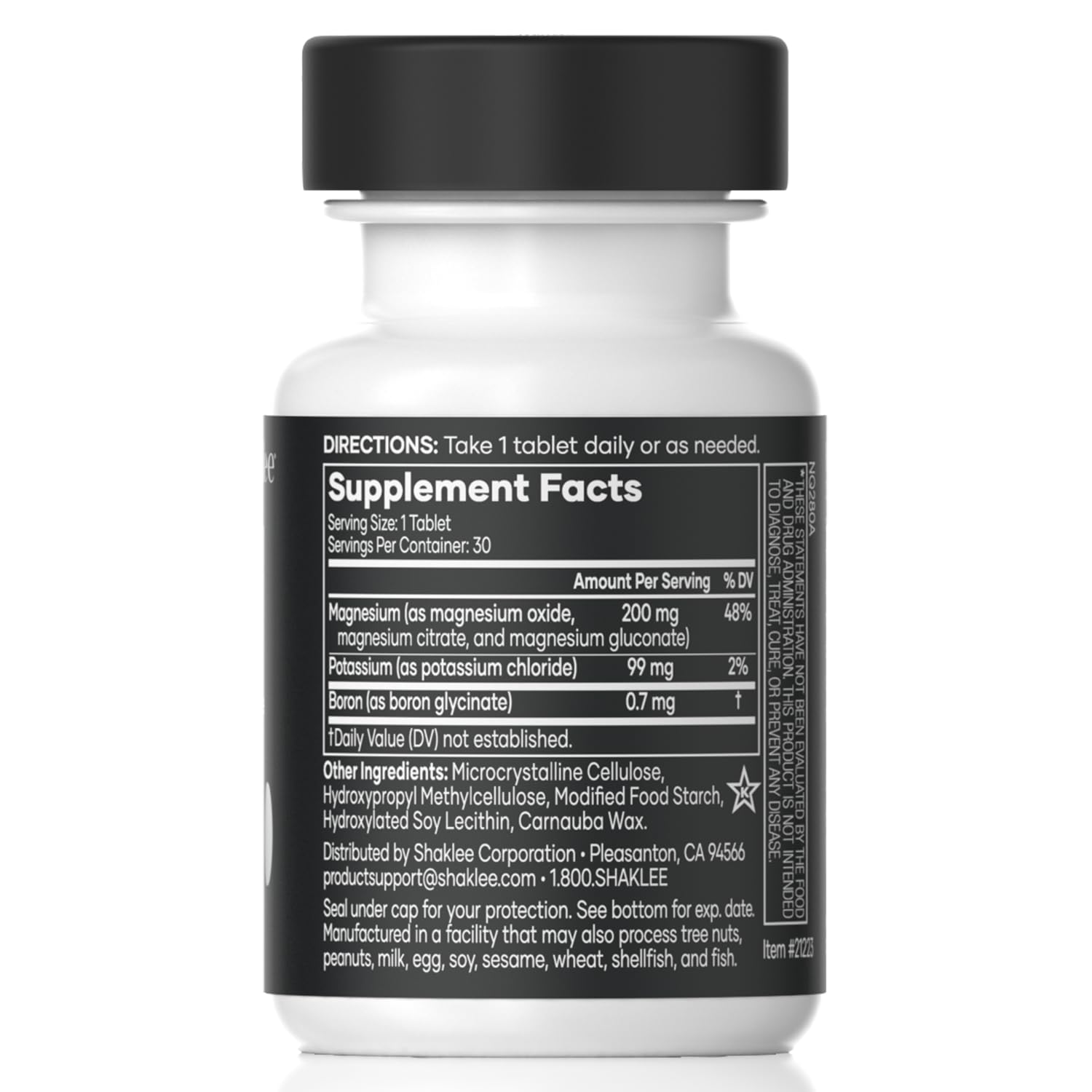 Shaklee VitalMag primer plano del comprimido mostrando textura y facilidad de ingestión