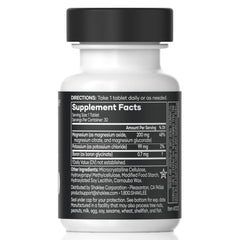 Shaklee VitalMag primer plano del comprimido mostrando textura y facilidad de ingestión