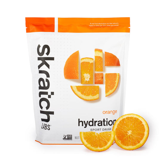 skratch labs paquete frontal naranja mostrando marca y beneficio hidratación rápida