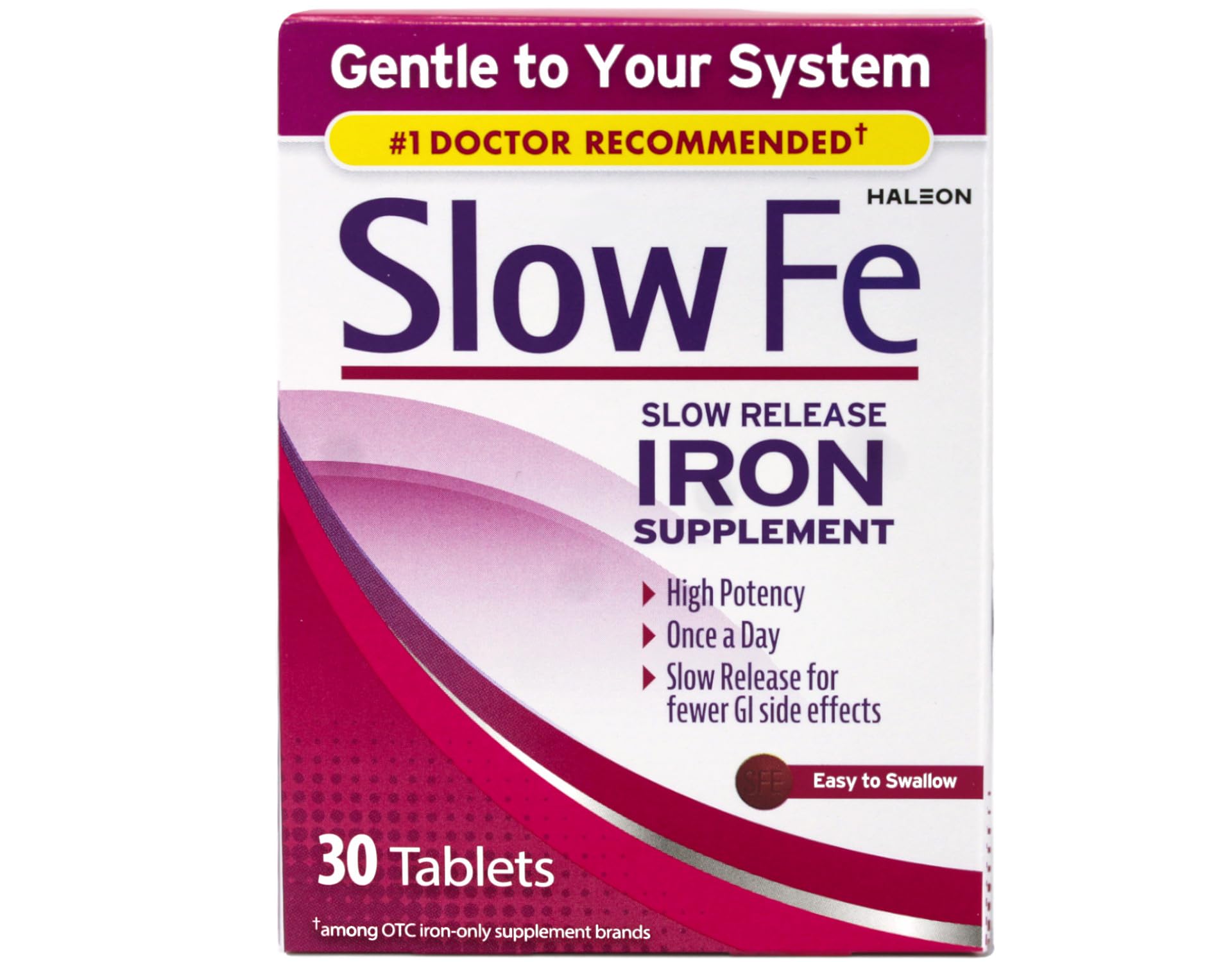 Slow Fe tableta en mano para comparar tamaño y facilidad de ingestión
