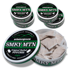 SMOKEY MOUNTAIN caja y latas frontal mostrando presentación práctica