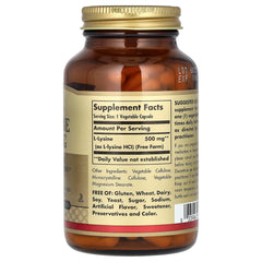 Solgar Lisina 500 mg, interior de envase, cápsulas veganas fáciles de tragar.