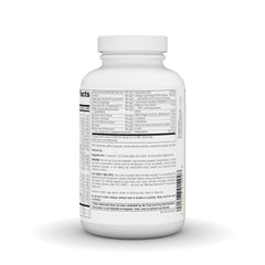 Source Naturals cápsula en mano para comparar tamaño y dosificación
