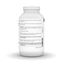 Source Naturals bote junto a un plato para mostrar uso con las comidas y facilidad