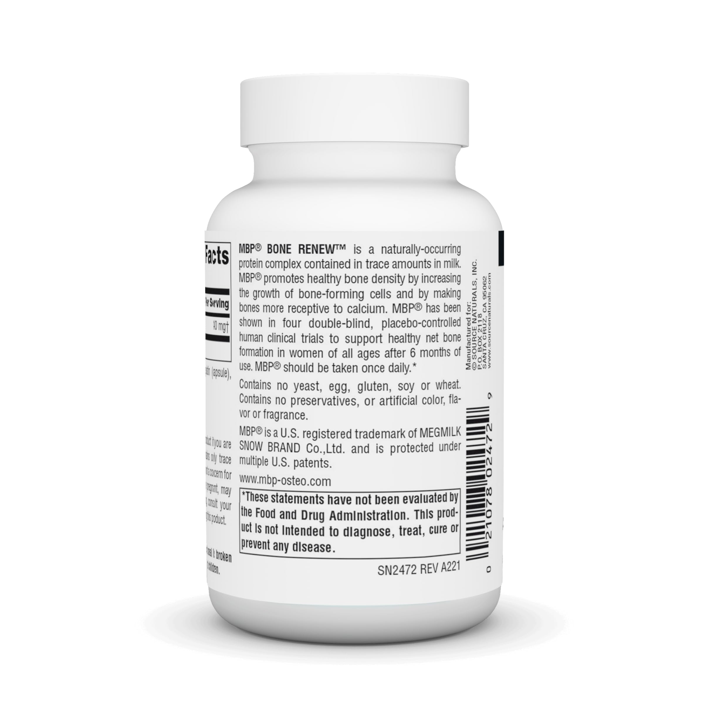 Source Naturals cápsula en mano para comparar tamaño y dosificación