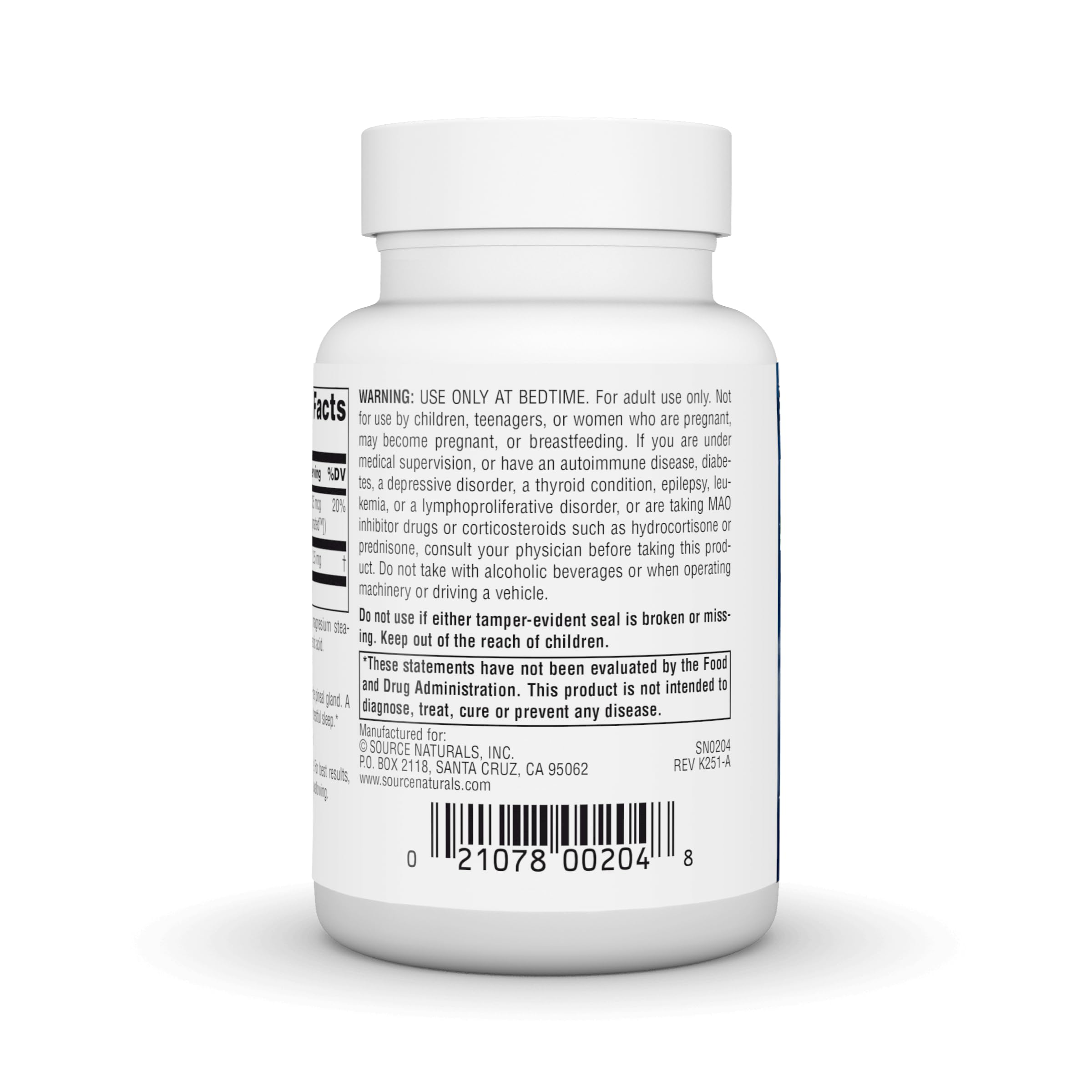 Source Naturals pastilla sobre mesita junto a almohada indicando uso nocturno