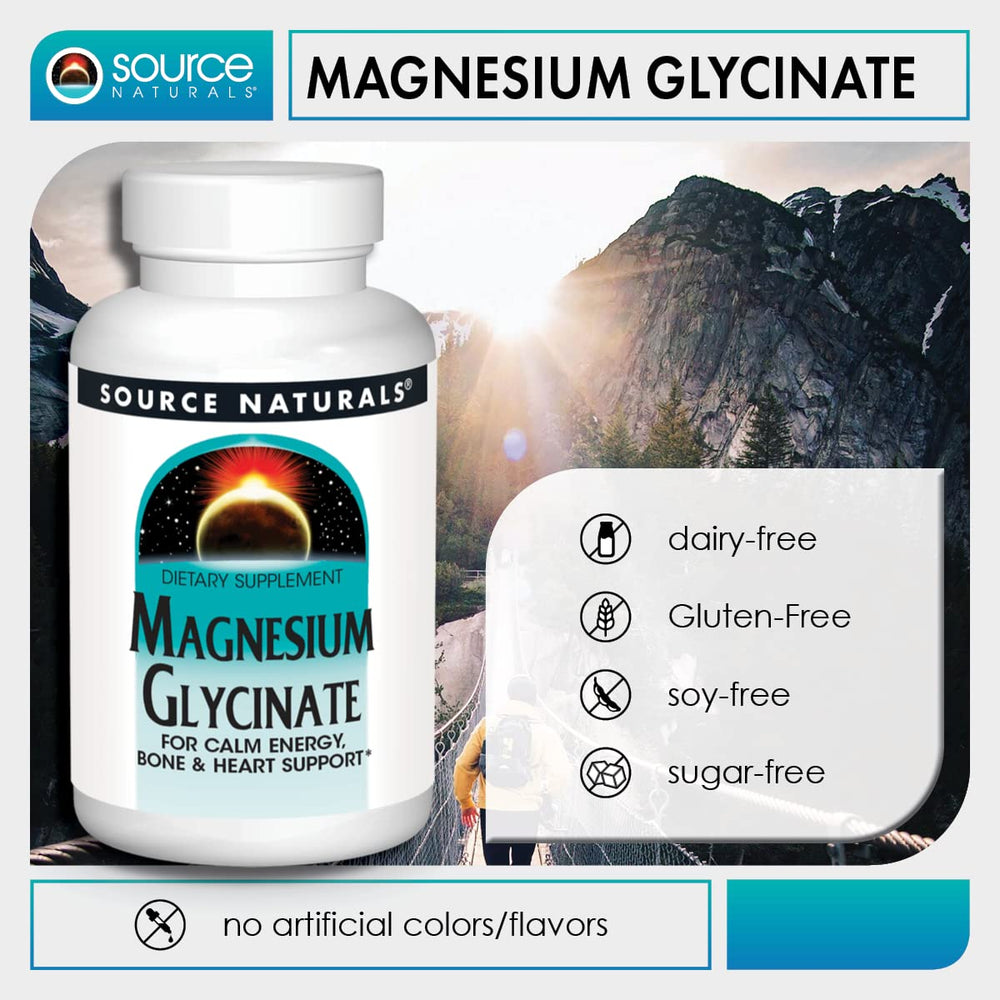 Source Naturals tabletas junto a alimentos sugiriendo toma con comidas para mejor absorción