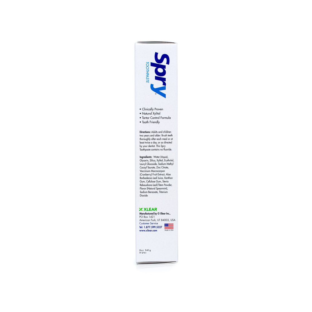 Spry etiqueta con xilitol, aloe y calcio destacando ingredientes naturales